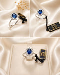 ANELLO CON ZAFFIRO BLU E DIAMANTI NATURALI, ORO BIANCO 18CT