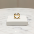 Anello da uomo in oro giallo e bianco con zircone
